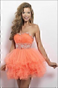 "At my best friend's wedding, her sister-in-law wore a salmon-colored dress that looked like a figure-skating costume. It was too short, strapless, and just all around completely inappropriate for their wedding." Credit: Coatpant.com