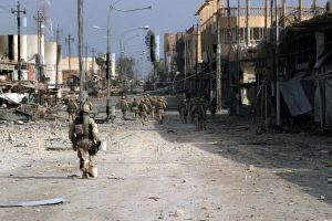 041114-M-8205V-005 Fallujah, Iraq (Nov. 15, 2004) - Iraqi Special Forces Soldiers assigned to the U.S. Marines of 2nd Squad, 3rd Platoon, L Company, 3rd Battalion, 5th Marine Regiment, 1st Marine Division, patrol south clearing every house on their way through Fallujah, Iraq, during Operation Al Fajr (New Dawn). Operation Al Fajr is an offensive operation to eradicate enemy forces within the city of Fallujah in support of continuing security and stabilization operations in the Al Anbar province of Iraq by units of the 1st Marine Division. U.S. Marine Corps photo by Lance Cpl. James J. Vooris (RELEASED)