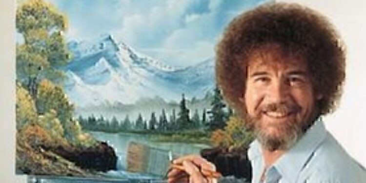 Bob Ross working on one of his famous paintings.