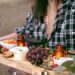 A young women carrying her homemade Thankgiving Day appetizer platter.